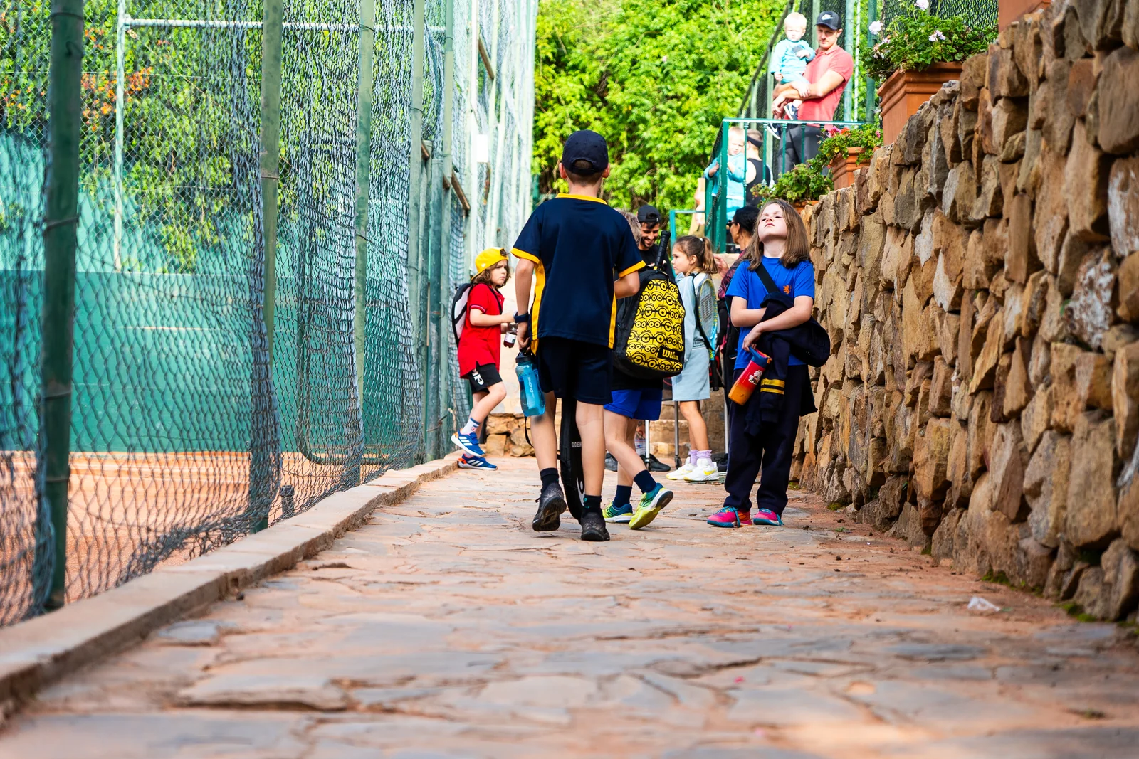 School students walking to the courts